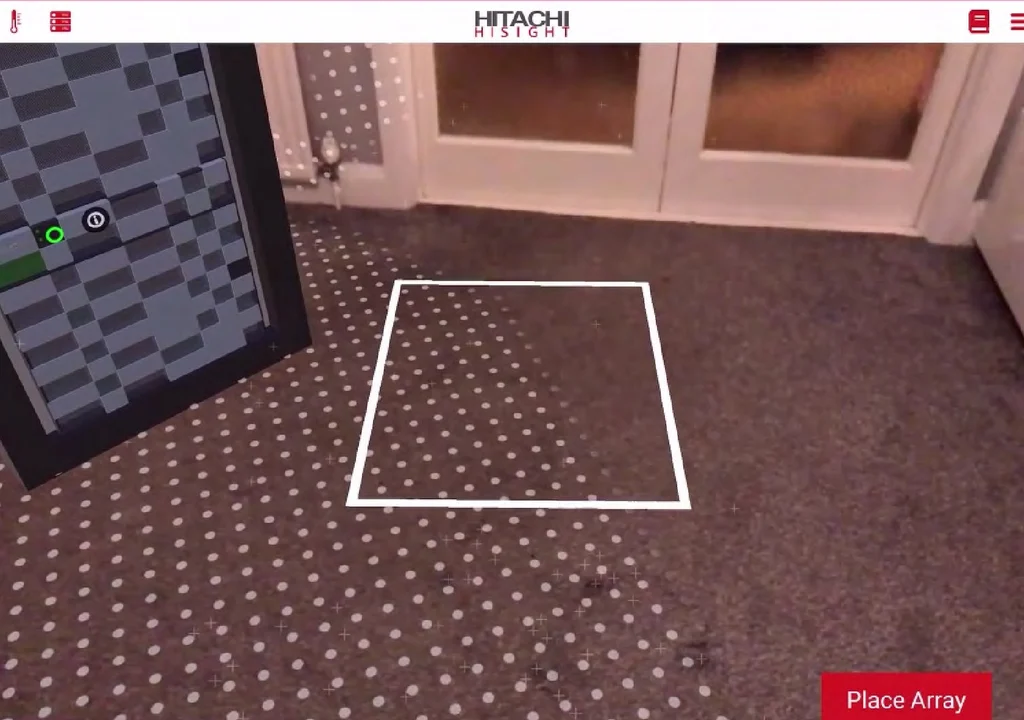 Placing an array in Project Sight: a white outline on a carpeted floor, seen through the device's camera, and a Place Array button.